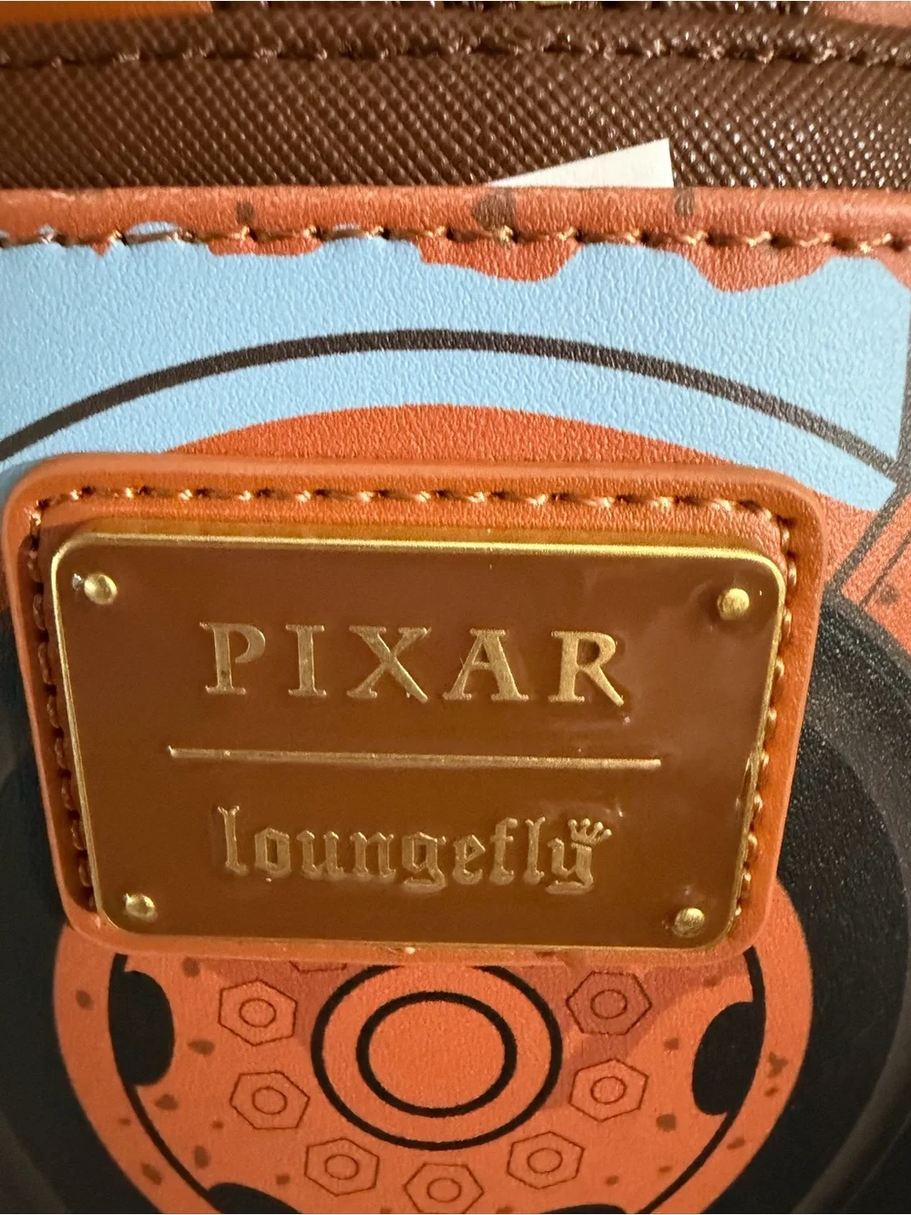 Loungefly Orange Tow Mater Mini Backpack with Character Face